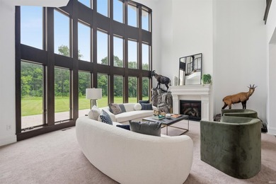 This exceptional Boone County property features a custom-built - photo 2