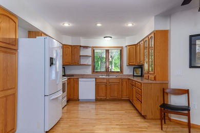 This great split-bedroom Ranch features spacious rooms, an open - photo 4