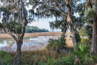 Enjoy amazing sunsets from almost every room of this marsh front - photo 11