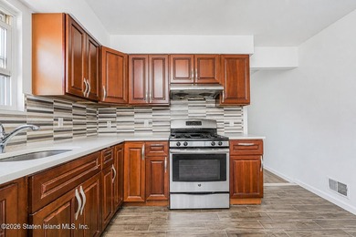Welcome to this well-maintained single-family semi-attached home - photo 11