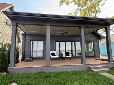Modern lakefront luxury meets timeless tranquility. Fully - photo 11