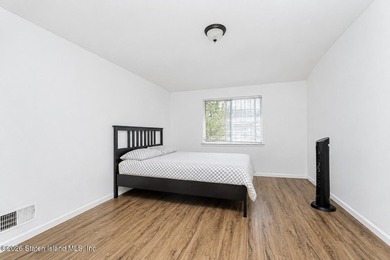 Welcome to this well-maintained single-family semi-attached home - photo 13