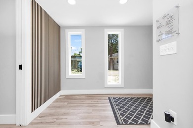 Modern lakefront luxury meets timeless tranquility. Fully - photo 13