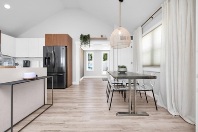 Modern lakefront luxury meets timeless tranquility. Fully - photo 19