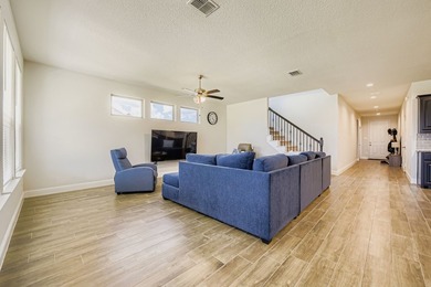 This like new, barely lived in smart home, features an open - photo 5