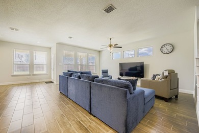 This like new, barely lived in smart home, features an open - photo 6