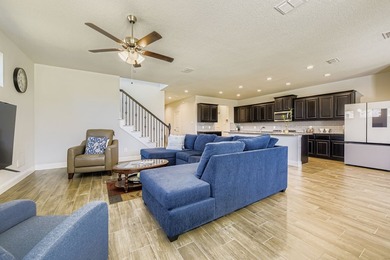 This like new, barely lived in smart home, features an open - photo 7