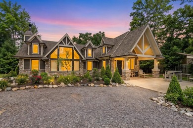 Enjoy peaceful lake living w/ 150' of frontage on private 9-acre - photo 1