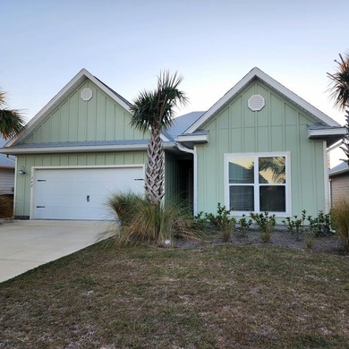 This BEACH VIEW home is TURNKEY and ready, and is one of the - photo 1