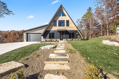 With over 200' of lake frontage and breathtaking views, this - photo 2