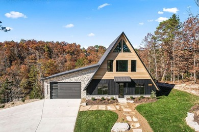 With over 200' of lake frontage and breathtaking views, this - photo 5