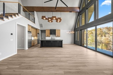 With over 200' of lake frontage and breathtaking views, this - photo 7