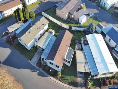 Well-Maintained Home in 55+ Park. Fresh carpet in the front room