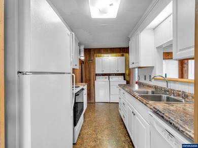 Well-Maintained Home in 55+ Park. Fresh carpet in the front room