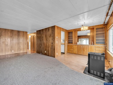 Well-Maintained Home in 55+ Park. Fresh carpet in the front room