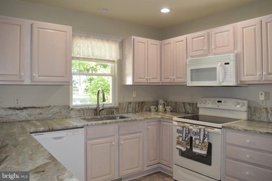 Nestled in the serene community of Captain's Cove, this is a - photo 12