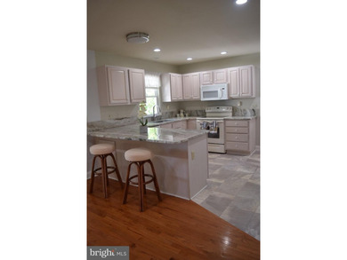 Nestled in the serene community of Captain's Cove, this is a - photo 14