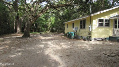 Beautiful large oak trees surround this 3bdrm 1bth home. No - photo 2