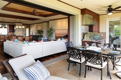 Perched above the shimmering coastline within the coveted - photo 5
