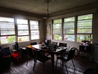Classic Hawaiian home built in the 1940's. High ceilings with - photo 3