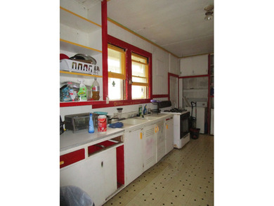Classic Hawaiian home built in the 1940's. High ceilings with - photo 6