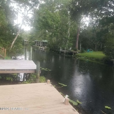 Rare opportunity to own a canal-front lot in the desirable Del - photo 1
