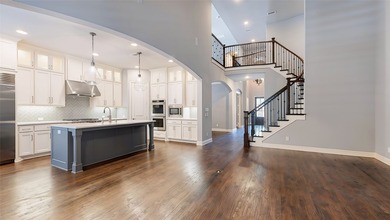 Experience refined lakeside living in the highly sought-after - photo 4