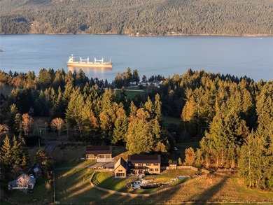 Set on five private acres along prestigious Cherry Point Road in - photo 2