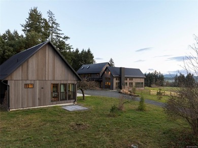 Set on five private acres along prestigious Cherry Point Road in - photo 8