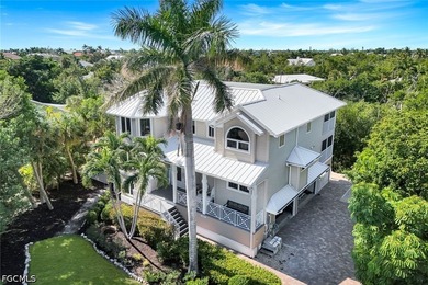 1111 Schooner Place, a stunning waterfront home on Sanibel - photo 1