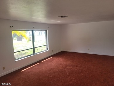 OPPORTUNITY KNOCKS! 3BR/2BA Pool home in SE Cape Coral featuring - photo 3