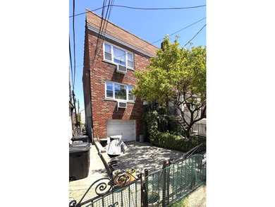 Beautifully updated two-family home in the Morris Park section - photo 30