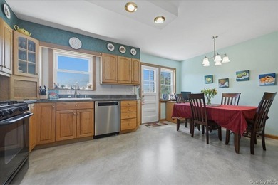 Well maintained three bedroom 1.5 bath triplex home with central - photo 11