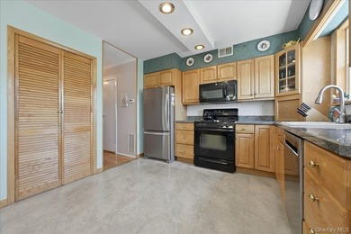 Well maintained three bedroom 1.5 bath triplex home with central - photo 13
