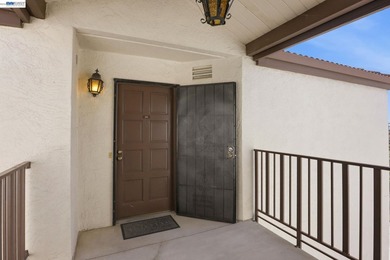This bright and inviting upper end-unit offers a rare - photo 3