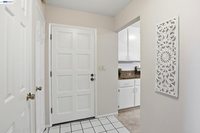 This bright and inviting upper end-unit offers a rare - photo 4