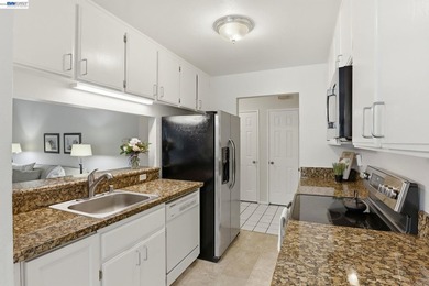 This bright and inviting upper end-unit offers a rare - photo 8