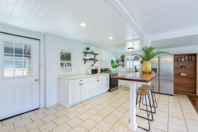 Welcome to this charming 2-family home nestled on a quiet - photo 4
