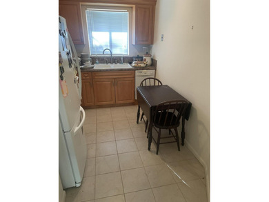 Charming first-floor condo. Step inside to find a spacious - photo 6