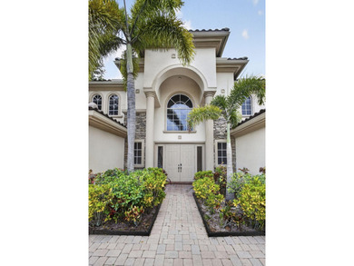 Located on a private cul-de-sac lakefront lot in the exclusive - photo 2