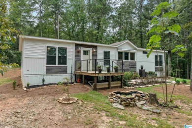 Lake Home For Sale in Mccalla, Alabama