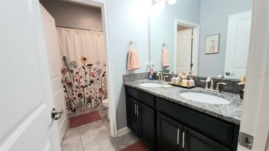 You'll fall in love with this comfortable four-bedroom home - photo 12