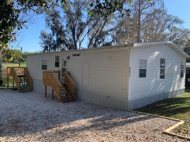 Mud River Home Sale Pending in Polk City Florida