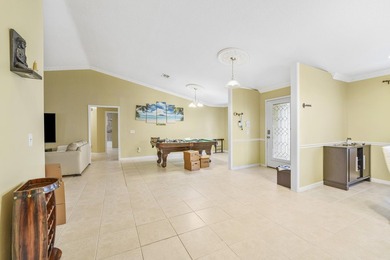 Private Florida resort-style brick home with screened pool - photo 14