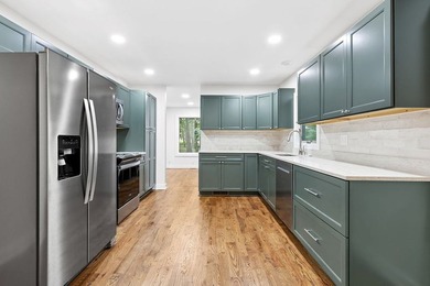 Beautifully renovated lakefront contemporary home, complete with - photo 15