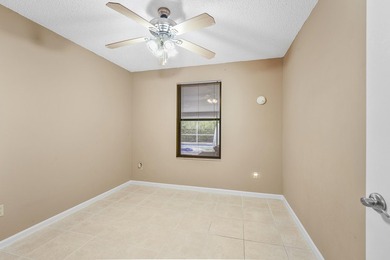 Private Florida resort-style brick home with screened pool - photo 24