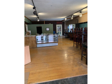 Excellent opportunity in this mixed use building to run your - photo 3