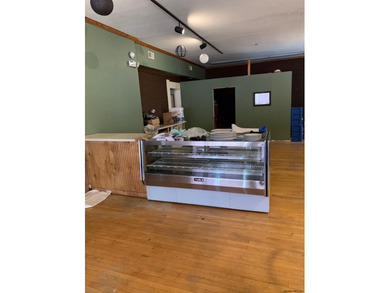 Excellent opportunity in this mixed use building to run your - photo 4