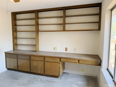 This 2-bedroom, 2-bathroom property offers genuine potential in - photo 4