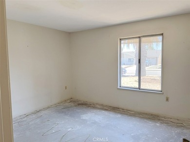 This 2-bedroom, 2-bathroom property offers genuine potential in - photo 5